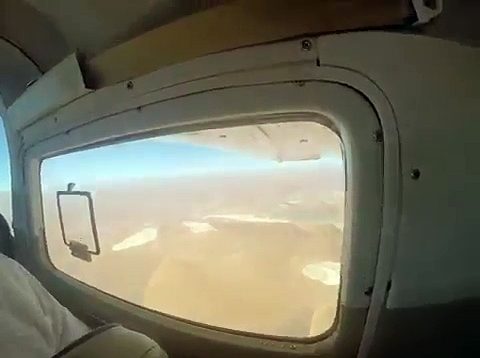 Quand régis prend une photo en avion